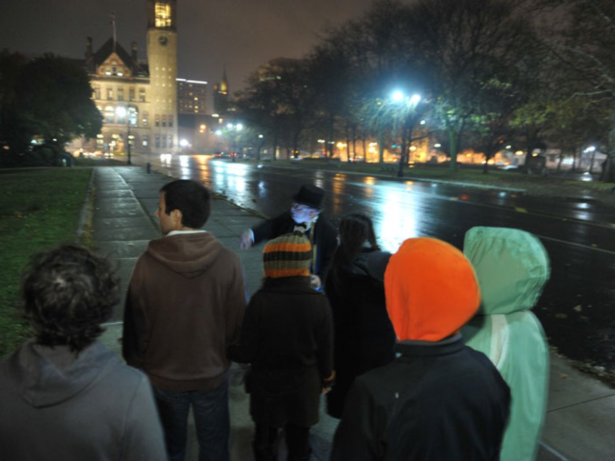 a group of people on a city street